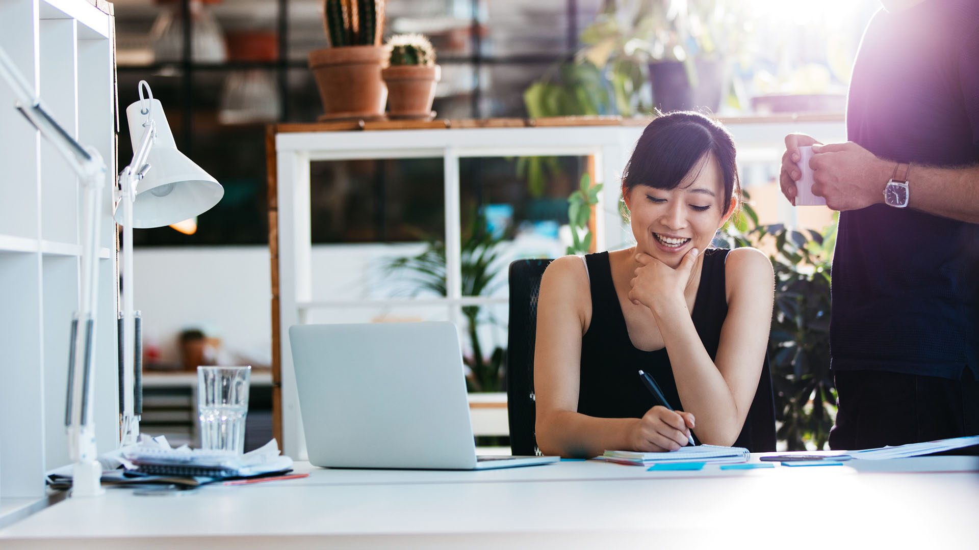 financial-planning-woman-sitting-on-desk